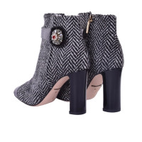 Dolce & Gabbana Ankle boots with brooch