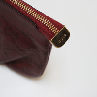 Gucci clutch with Guccissima pattern