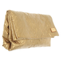 Louis Vuitton Limelight Clutch in Gold