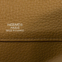 Hermès Atlas Leer in Oker