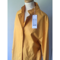 Closed Raincoat in yellow