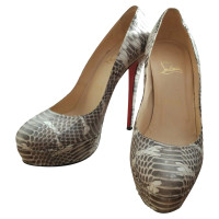 Christian Louboutin Pumps/Peeptoes en Cuir en Beige