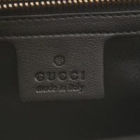 Gucci clutch in ottica olografiche