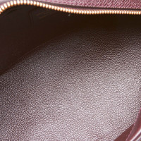 Louis Vuitton "Trousse toilet 24 taiga leather"