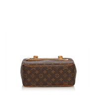 Louis Vuitton "Cite MM Monogram Canvas"