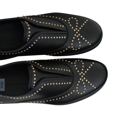 Moschino Slipper/Ballerinas aus Leder in Schwarz