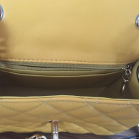 Chanel Classic Flap Bag Mini Square Leer in Geel