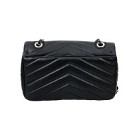 Chanel "Classic Flap Bag"