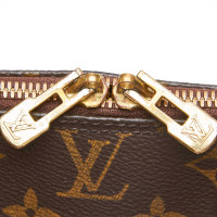 Louis Vuitton Alma PM32 in Tela in Marrone