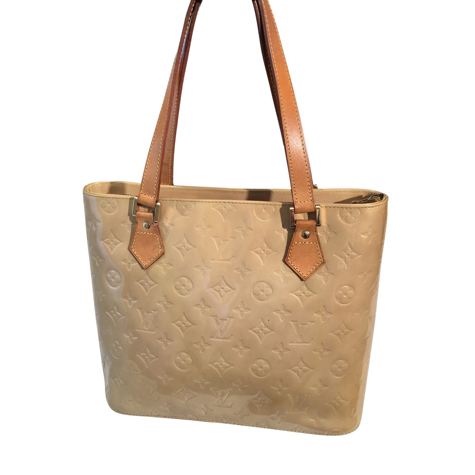 Louis Vuitton Beige patent leather bag .