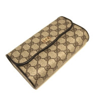 Gucci clutch with Guccissima pattern