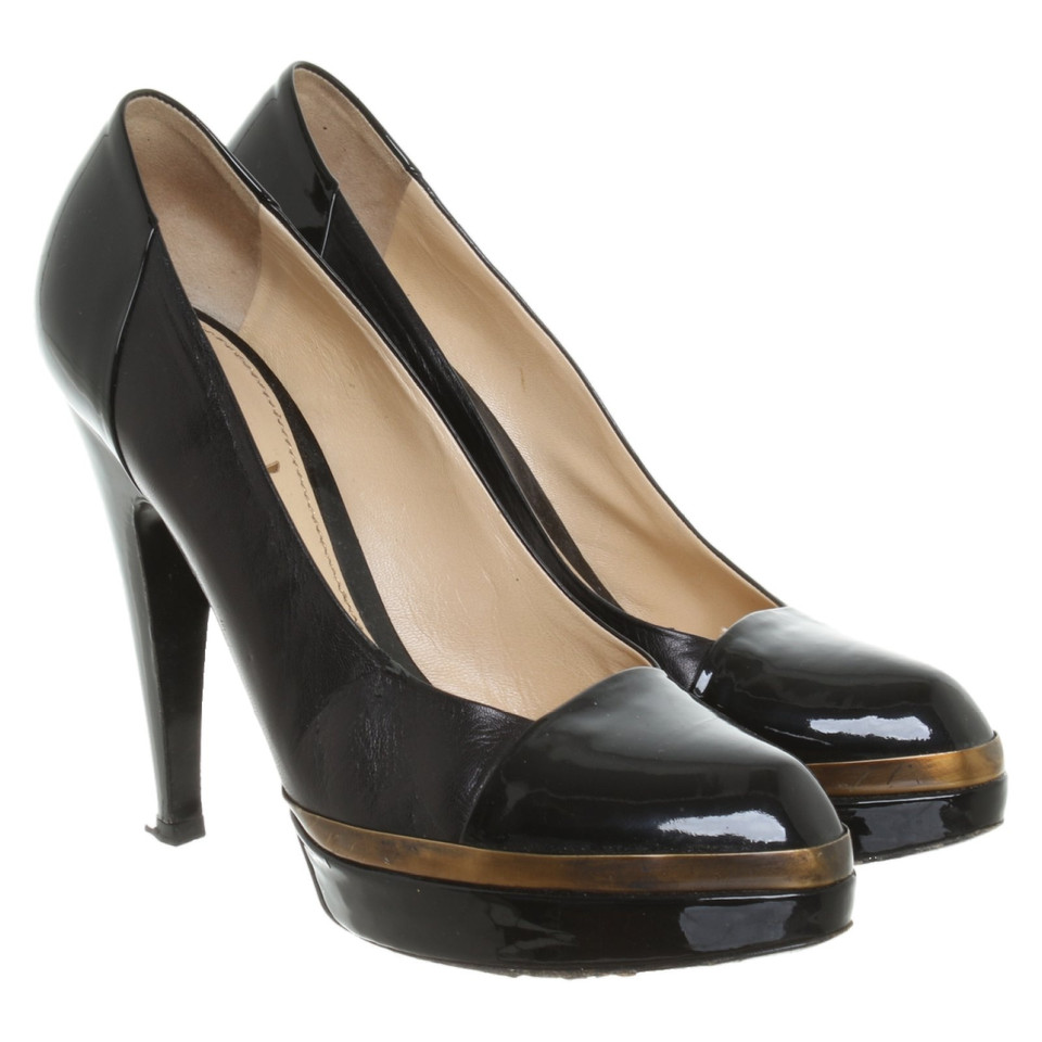 Yves Saint Laurent pumps in black / brown