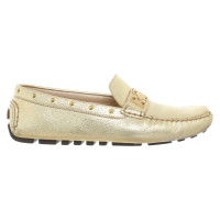 Louis Vuitton Loafers in gold