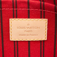 Louis Vuitton "Neverfull Wristlet Monogram Canvas"