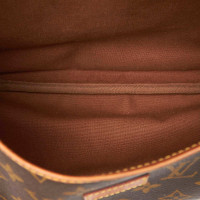 Louis Vuitton Saumur 35 en Toile en Marron