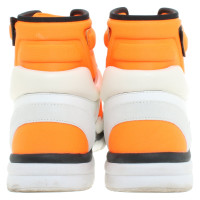 Chanel Sneakers in white / orange