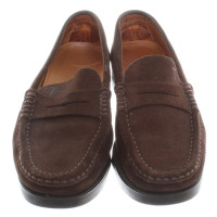 Tod's Wild leather slippers in brown