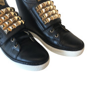 Hermès Sneakers aus Leder in Schwarz