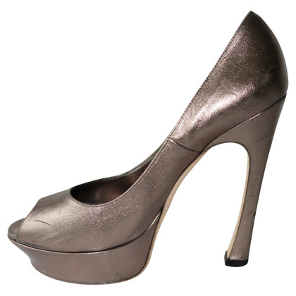 Yves Saint Laurent Pumps/Peeptoes Leather in Gold