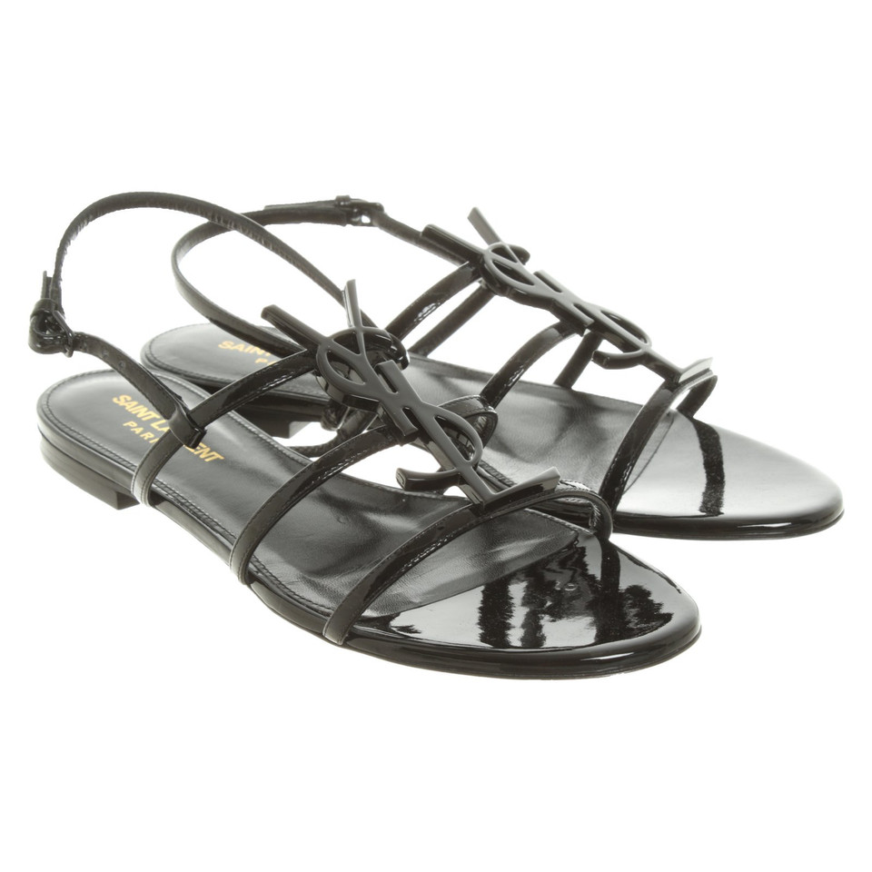 Saint Laurent Cassandra Flat Sandals aus Lackleder in Schwarz