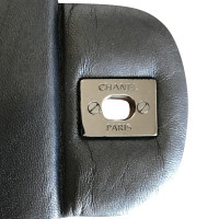 Chanel "Classic Maxi Flap Bag"