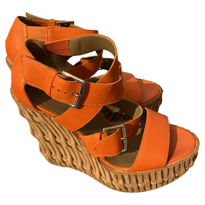 Hermès Chaussures compensées en Cuir en Orange