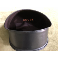 Gucci Des lunettes de soleil