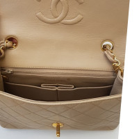 Chanel Classic Flap Bag New Mini en Cuir en Beige