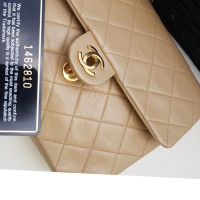 Chanel Classic Flap Bag New Mini en Cuir en Beige