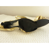 Yves Saint Laurent Golden sandals