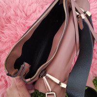 Coccinelle dusty pink flap bag