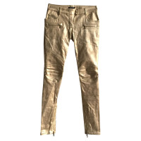 Balmain Jeans aus Baumwolle in Gold