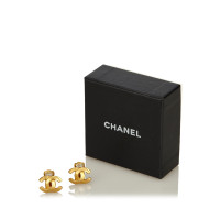 Chanel CC Clip de ton or sur boucles d'oreilles
