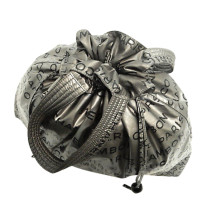 Chanel "Drawstring Bucket Bag"
