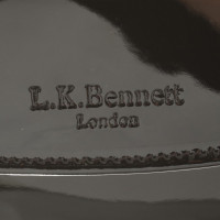 L.K. Bennett cuir verni clutch