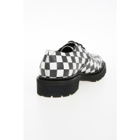 Saint Laurent Chaussures à lacets en noir et blanc