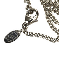 Chanel collier avec pendentif logo