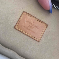 Louis Vuitton Manhattan Leather in Brown
