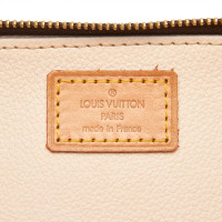 Louis Vuitton "Trousse Blush Monogram Canvas"