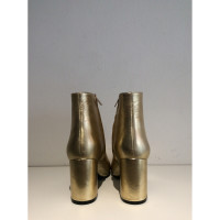 Anine Bing Goldfarbene Stiefeletten