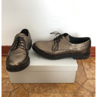 Brunello Cucinelli Lace-up shoes Leather in Gold