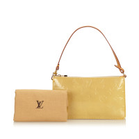 Louis Vuitton Pochette Mini Leather in Beige