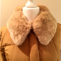 Salvatore Ferragamo Quilted jacket with fur collar