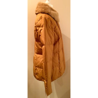 Salvatore Ferragamo Quilted jacket with fur collar