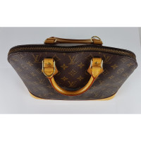 Louis Vuitton Alma PM32 in Tela in Marrone