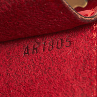 Louis Vuitton Pochette Mini aus Leder in Rot