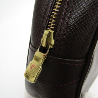 Louis Vuitton Pochette Mini Leer in Bruin