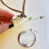 Hermès Necklace with perfume bottles-pendant