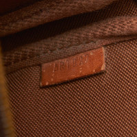 Louis Vuitton Pochette Mini Canvas in Brown