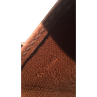 Louis Vuitton "Cartouchiere MM Monogram Canvas"